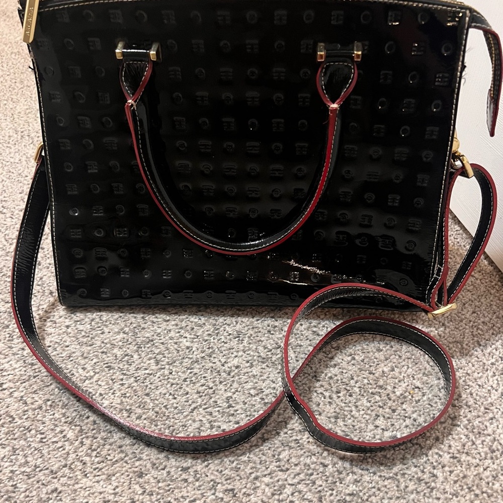 Like New Arcadia Black Leather Handbag with Red Accents.